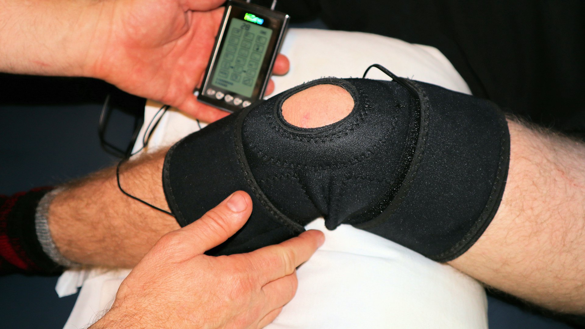 Therapy device applied to a patient's knee