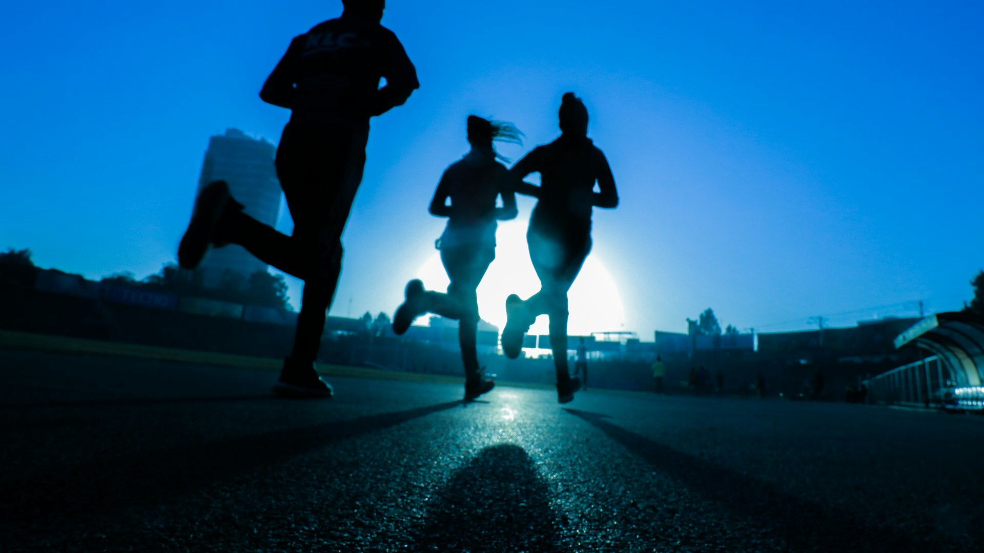Runners training at sunrise