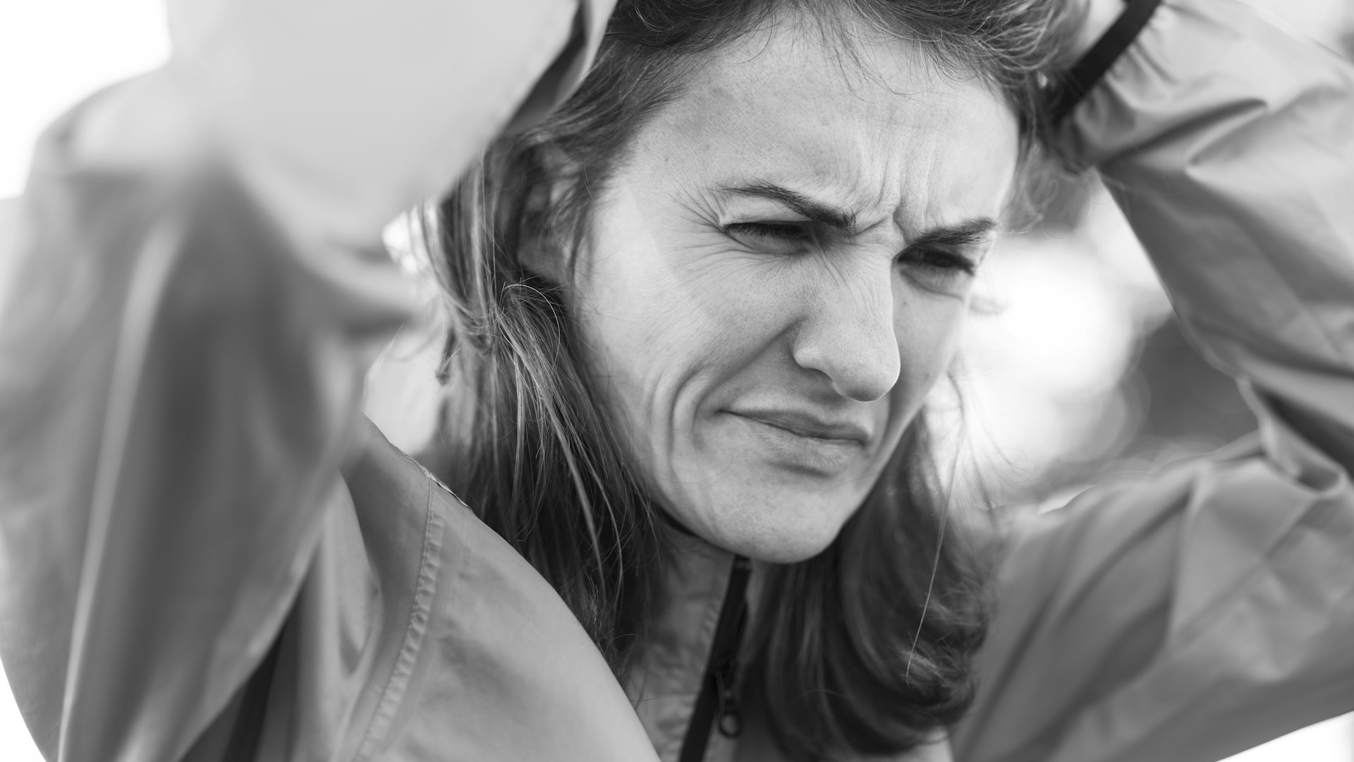 Woman holding her head during a dizzy spell